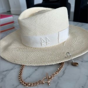 Ruslan Baginskiy hat with golden chain